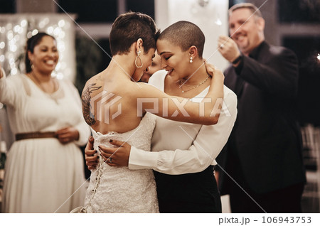Wedding, love and dance with a lesbian couple in celebration of their union together at a ceremony of tradition. LGBT, woman or diversity with a female and partner dancing after being married 106943753