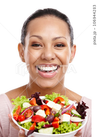 Happy, wellness and portrait of black woman with salad for health, diet and lose weight nutrition lifestyle. Attractive smile of excited woman with healthy food on isolated white background Happy, wellness and portrait of black woman with salad for health, diet and lose weight nutrition lifestyle. Attractive smile of excited woman with healthy food on isolated white background 106944283