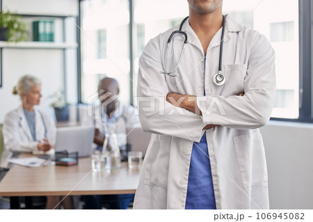 Leadership, arms crossed and medical with hands of doctor for professional healthcare and surgery in clinic. Wellness, confidence and trust with leader man standing in hospital for expert consulting Leadership, arms crossed and medical with hands of doctor for professional healthcare and surgery in clinic. Wellness, confidence and trust with leader man standing in hospital for expert consulting 106945082