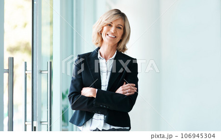 Trust me, Im a psychologist. Portrait of a confident mature psychologist working in a modern office. Trust me, Im a psychologist. Portrait of a confident mature psychologist working in a modern office. 106945304