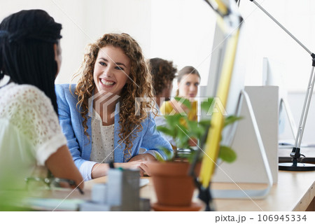 Funny, happy woman or business women on break talking, chatting or speaking of gossip news together. Bonding, friends laughing or relaxed employees in conversation or discussion about people at desk Funny, happy woman or business women on break talking, chatting or speaking of gossip news together. Bonding, friends laughing or relaxed employees in conversation or discussion about people at desk 106945334