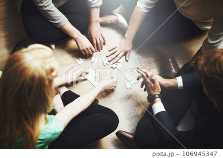 Puzzle, group and people thinking, teamwork and solution, collaboration or workflow in problem solving and challenge. Team building games, project development and women or men in circle brainstorming 106945347