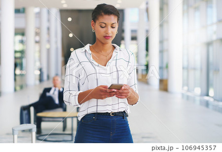 Business woman, phone or reading email communication on web app while sitting at office. Black woman smartphone typing, message app or social media on mobile smartphone or internet technology at work 106945357