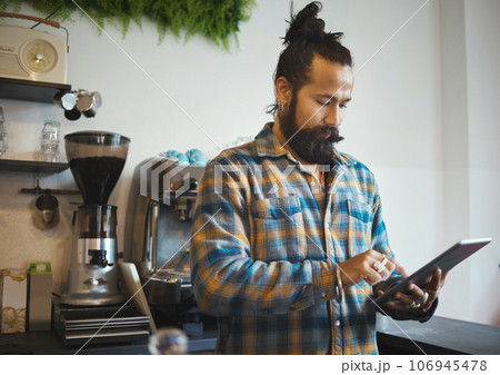 Tablet work, barista and cafe owner working on digital retail shop design for business. Coffee shop waiter, ecommerce and man planning a restaurant web page for online shopping and networking 106945478