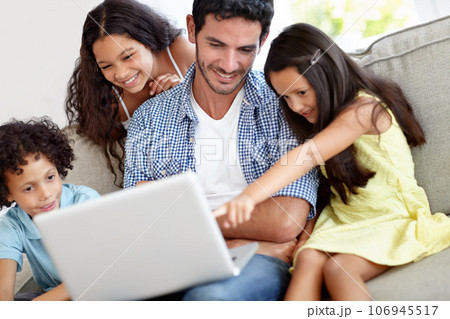 Laptop, pointing and happy family father, children or people gesture at online website, social network video or meme. Smile, love and group of kids with papa streaming home subscription movie 106945517