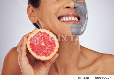 Skincare, grapefruit and woman with a face mask with charcoal, clay or natural beauty product for wellness, detox or nutrition. Fruit, healthy cosmetics and girl happy with vitman c or facial care Skincare, grapefruit and woman with a face mask with charcoal, clay or natural beauty product for wellness, detox or nutrition. Fruit, healthy cosmetics and girl happy with vitman c or facial care 106945537