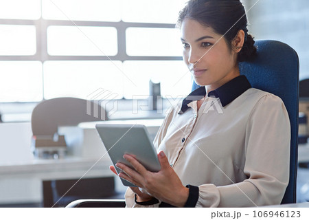 Business woman, tablet and office with thinking, vision and planning at desk for schedule, calendar and goals. Young executive, mobile touchscreen tech and focus in workplace for ideas on digital app Business woman, tablet and office with thinking, vision and planning at desk for schedule, calendar and goals. Young executive, mobile touchscreen tech and focus in workplace for ideas on digital app 106946123