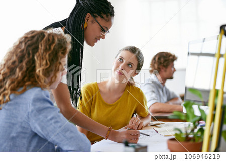 Woman, floor plan or engineering manager writing or planning project talking with leadership in meeting. Coaching women, teamwork or designers working on strategy of architecture blueprint in office Woman, floor plan or engineering manager writing or planning project talking with leadership in meeting. Coaching women, teamwork or designers working on strategy of architecture blueprint in office 106946219