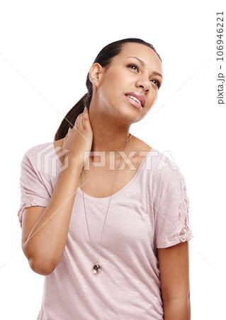 Stress, uncomfortable and model in studio with neck pain, injury or accident for medical emergency. Painful, hurt and girl from Mexico with muscle sprain, sore or tension isolated by white background 106946221