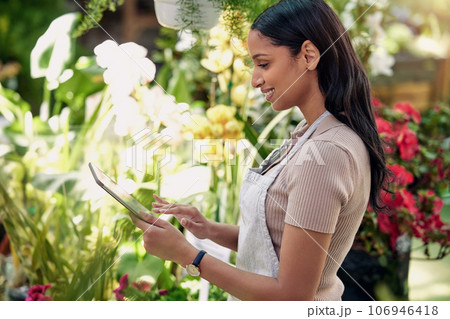Woman, tablet and plants in nursery, check and quality inspection for growth, development and health. Young business owner, entrepreneur and inventory for flowers, sustainability and gardening store Woman, tablet and plants in nursery, check and quality inspection for growth, development and health. Young business owner, entrepreneur and inventory for flowers, sustainability and gardening store 106946418