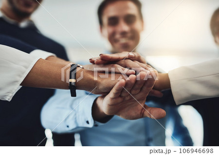 Trust, support and unity by a team of partners starting a business together. Community and teamwork with a group of excited, diverse professionals with an idea, vision or goal for a startup 106946698