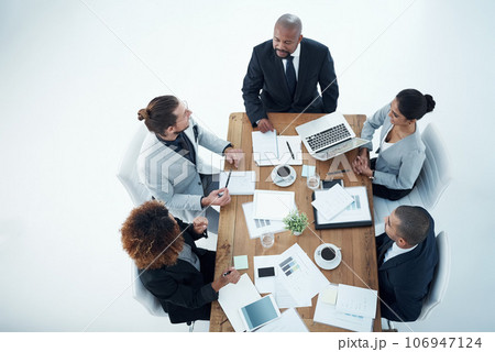 Business meeting, documents and people planning, talking and collaboration of financial report, charts or graphs. Women, men and manager for paperwork, finance data or stats above on white background 106947124