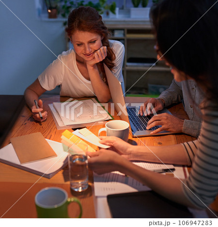 Collaboration, dark and a business team working in the boardroom for planning, strategy or innovation. Meeting, teamwork and overtime with a group of employees at work together for design at night 106947283