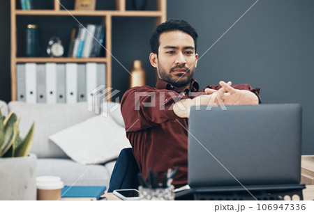 Laptop, working and man stretching fingers for carpal tunnel, muscle health or self care with work from home job. Business asian person or worker on computer and hands stretch to prepare for tasks 106947336