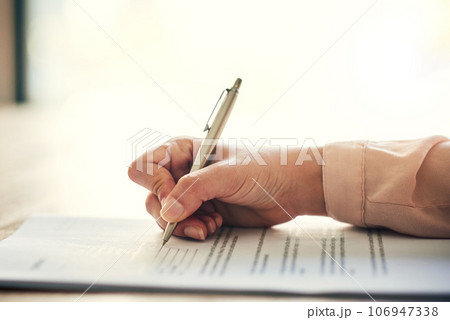 Contract, document and paper work closeup of businesswoman signing, writing or filling out personal information, insurance or job form. Professional reading recruitment paperwork at a hiring company 106947338
