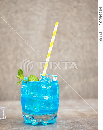 blue lemonade in a glass with ice 106947644
