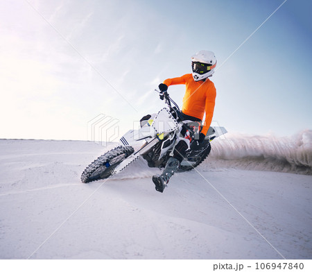 Bike, sand and speed with a man on mockup riding a vehicle in the desert for adventure or adrenaline. Motorcycle, training and freedom with an athlete on space in nature for power or extreme sports 106947840