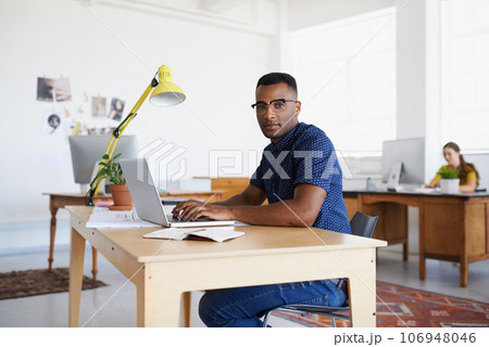 Journalist, portrait or serious black man typing on laptop working on email, business project or online research. Computer, digital or focused worker copywriting on blog, reports or internet article 106948046