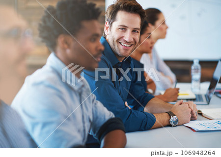 Portrait, happy and a business man in the boardroom with his team during a meeting for planning. Smile, strategy or collaboration with a male employee and colleagues in the office for a seminar 106948264