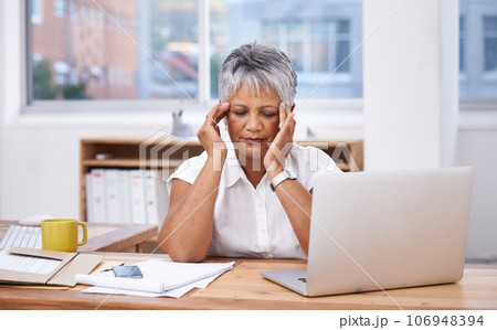 Stress, headache and woman on laptop in office administration for migraine, burnout or mistake. Brain fog, problem or migraine of senior business person massage temple and planning on her computer Stress, headache and woman on laptop in office administration for migraine, burnout or mistake. Brain fog, problem or migraine of senior business person massage temple and planning on her computer 106948394