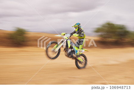 Speed, nature and a person on a motorbike for a race, travel or freedom in sports. Cycling, power and a man or professional driver with energy on a bike while driving for a challenge on a course 106948713