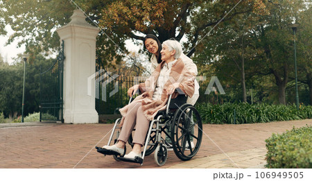 Senior woman, wheelchair and caregiver in park, nature or garden outdoor together. Happy, elderly person with a disability and walking for health, wellness and physical therapy for rehabilitation Senior woman, wheelchair and caregiver in park, nature or garden outdoor together. Happy, elderly person with a disability and walking for health, wellness and physical therapy for rehabilitation 106949505