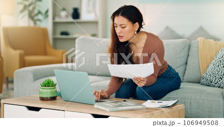 Woman, paper and laptop in living room on sofa working on project, assignment or task for college or business. Student, girl and home to study, for test or exam at university with handheld movement Woman, paper and laptop in living room on sofa working on project, assignment or task for college or business. Student, girl and home to study, for test or exam at university with handheld movement 106949508