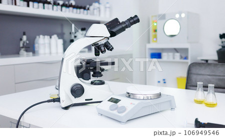 Backgrounds, science scale and microscope in laboratory for innovation, medical research or investigation of dna, particles or medicine. Biotechnology tools, chemistry or empty for health development Backgrounds, science scale and microscope in laboratory for innovation, medical research or investigation of dna, particles or medicine. Biotechnology tools, chemistry or empty for health development 106949546