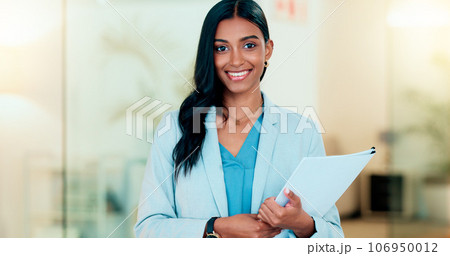 Happy, confident and successful businesswoman holding files while doing admin in an office. Female executive and entrepreneur ready to work with a positive attitude. HR manager ready to do interview 106950012