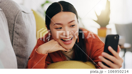 Asian woman, selfie and lying on sofa with peace sign and love for profile picture, vlog or social media at home. Happy female relaxing with smile and hand signs for photo or online vlogging on couch Asian woman, selfie and lying on sofa with peace sign and love for profile picture, vlog or social media at home. Happy female relaxing with smile and hand signs for photo or online vlogging on couch 106950214