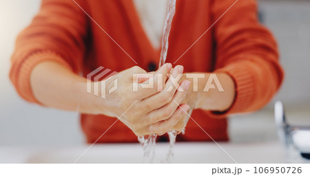 Washing hands, water and cleaning at sink in bathroom for hygiene, wellness or health. Skincare, liquid and woman clean hand to remove bacteria, germs and dirt, sanitary and disinfection in home. Washing hands, water and cleaning at sink in bathroom for hygiene, wellness or health. Skincare, liquid and woman clean hand to remove bacteria, germs and dirt, sanitary and disinfection in home. 106950726