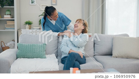 Caregiver, conversation and happy elderly woman speaking, chat and discussion about support, senior care or health service. Retirement healthcare, nursing home help and nurse talking to relax patient 106950976