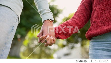 Family, holding hands and mother with child outdoor, bonding and travel. Support, walking and mom with kid for safety, security and care, trust and love while enjoying quality time together in nature Family, holding hands and mother with child outdoor, bonding and travel. Support, walking and mom with kid for safety, security and care, trust and love while enjoying quality time together in nature 106950982
