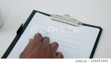 Life insurance, contract and signature with hands of person for planning, information or deal. Policy, legal documents and form with closeup of client reading in law firm for report and application 106951095