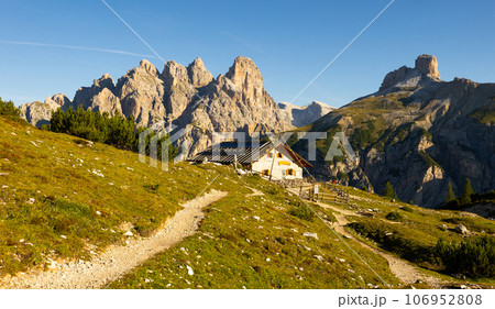 Trekking trail in Italian Dolomiti, Malga Langalm, Italy 106952808