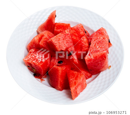 In plate there is small portion of watermelon pulp, useful cubes In plate there is small portion of watermelon pulp, useful cubes 106953271