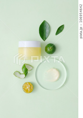 Scene for advertising cosmetic with ingredient from kumquat. Kumquats have antioxidant, anti-inflammatory and immune-boosting properties 106954642