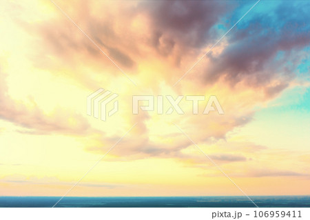 Colorful cloudy sky at sunset. Gradient color. Sky texture. Abstract nature background 106959411