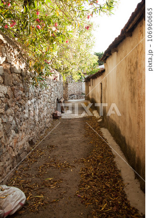 Old Datca streets with its unique architecture and people walking around, Mugla Datca Turkey, June 29 2023 106960665