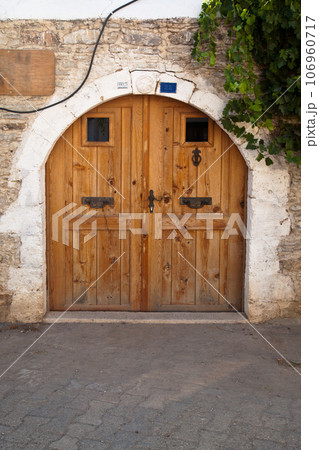 Wooden natural door of nostalgic house in Datca or Old Datca, Mugla Turkey, june 29 2023 Wooden natural door of nostalgic house in Datca or Old Datca, Mugla Turkey, june 29 2023 106960717