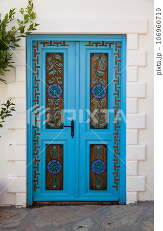 Wooden blue door of nostalgic house in Datca or Old Datca, Mugla Turkey, june 29 2023 Wooden blue door of nostalgic house in Datca or Old Datca, Mugla Turkey, june 29 2023 106960719
