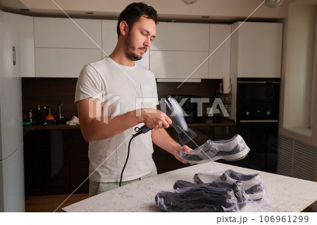 vacuum packing sneakers. for seasonal storage close-up. 106961299