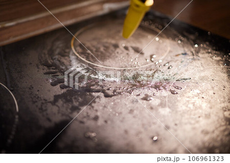 Cleaning of induction cooker with steam cleaner Cleaning of induction cooker with steam cleaner 106961323