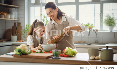 Happy family in the kitchen. 106962099