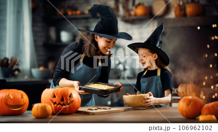family preparing for Halloween 106962102