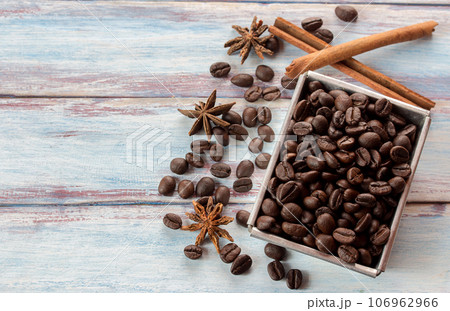 Close up coffee beans on wooden table 106962966
