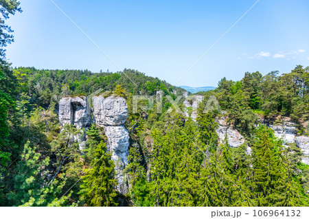 Panoramic view of a sandstone rock city in Bohemian Paradise, Czech: Cesky raj. Slunecna Rock in Hruba skala rock city town. Czech Republic Panoramic view of a sandstone rock city in Bohemian Paradise, Czech: Cesky raj. Slunecna Rock in Hruba skala rock city town. Czech Republic 106964132