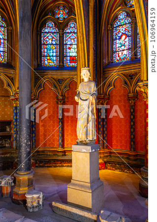 Lower chapel of Sainte-Chapelle with statue of Louis IX. Palais de la Cite, Paris, France Lower chapel of Sainte-Chapelle with statue of Louis IX. Palais de la Cite, Paris, France 106964159