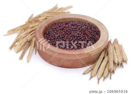 Fresh mustard in a wooden bowl Fresh mustard in a wooden bowl 106965016