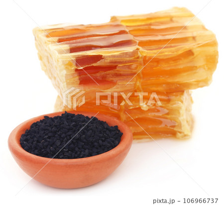 Honey with black cumin in a pottery Honey with black cumin in a pottery 106966737
